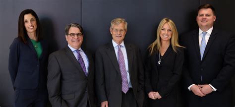 Law firm names 2 new partners .